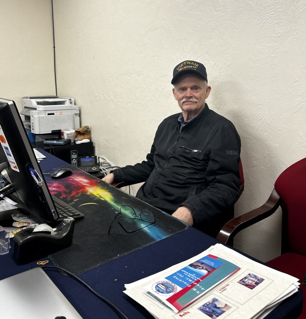 David Stahl, founder of NW Trucking Academy, at his desk