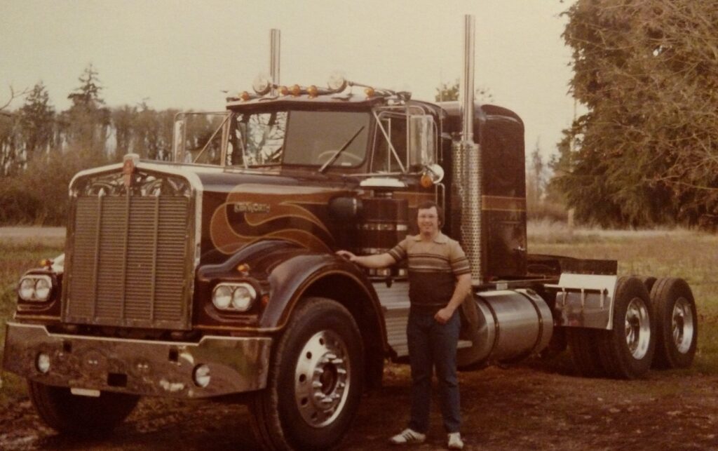 Steve Wilt standing next to his first truck in 1979
